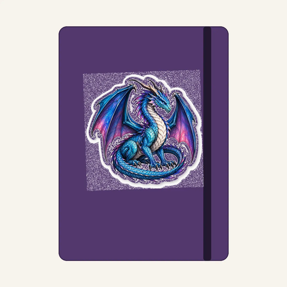 Fantasy dragon die-cut vinyl sticker displayed on journal